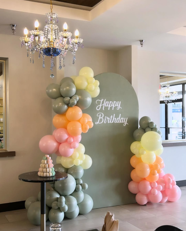 sage green yellow pink balloon decorations